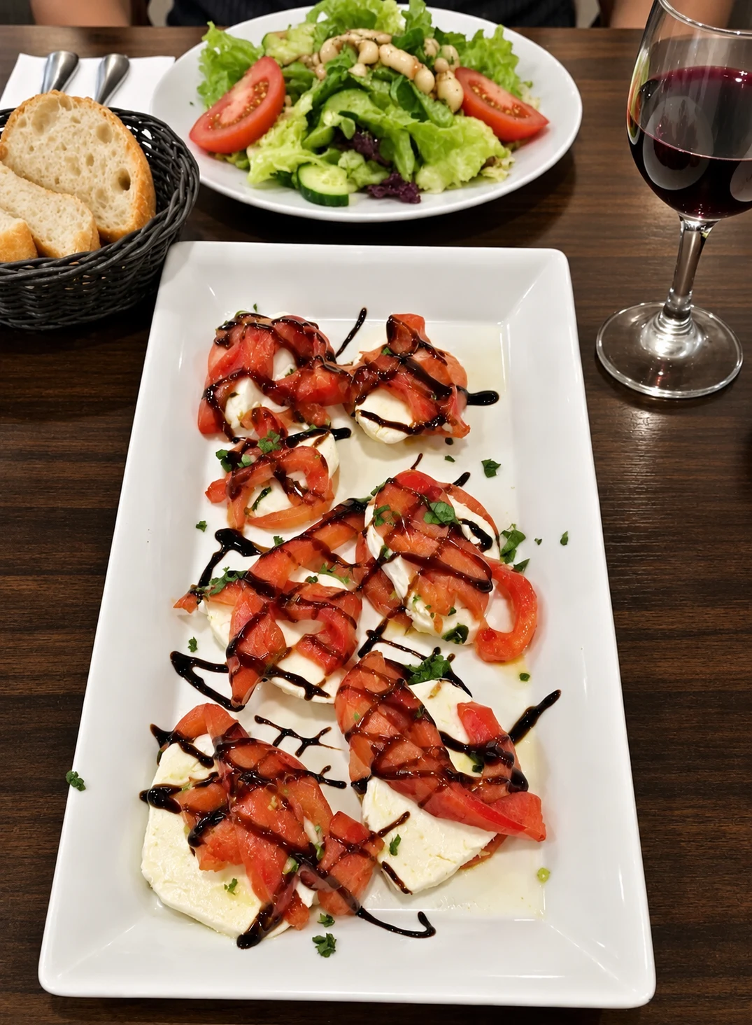 Fresh mozzarella and tomatoes with balsamic glaze